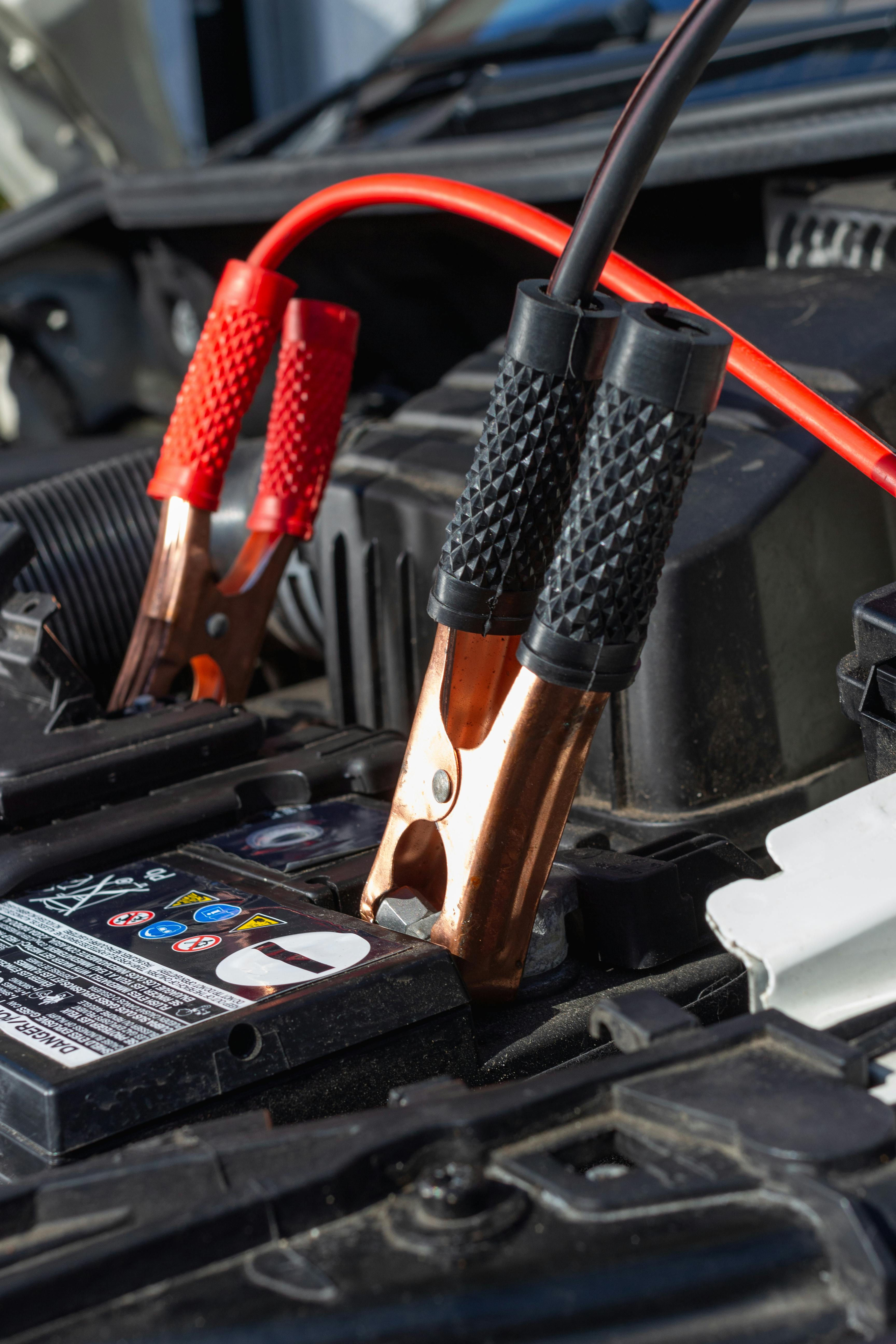 Battery testing clamps connected for a voltage and no-start check.